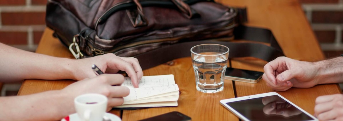 People discussing at the table